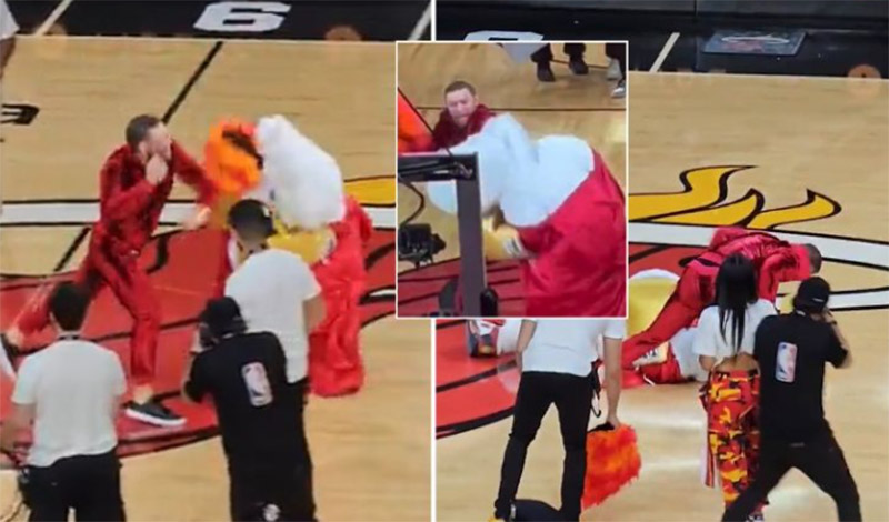 conor mcgregor punches maskot